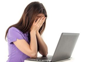 How To Fix Writer's Block-A women stressed out over her computer image 2 on the post