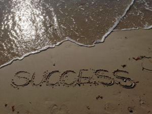 How To Fix Writer's Block-A Image of the word Success drawn into the sand on a beach Image 7 of the blog post