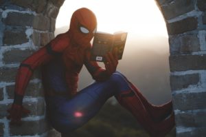 How To Become A Polymath - image 5 of Spiderman reading a book from a tower window